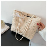 Women's Retro Art Handbag Straw Woven Shoulder Bag